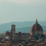 Explore the breathtaking aerial view of Florence featuring the iconic Cathedral of Santa Maria del Fiore.